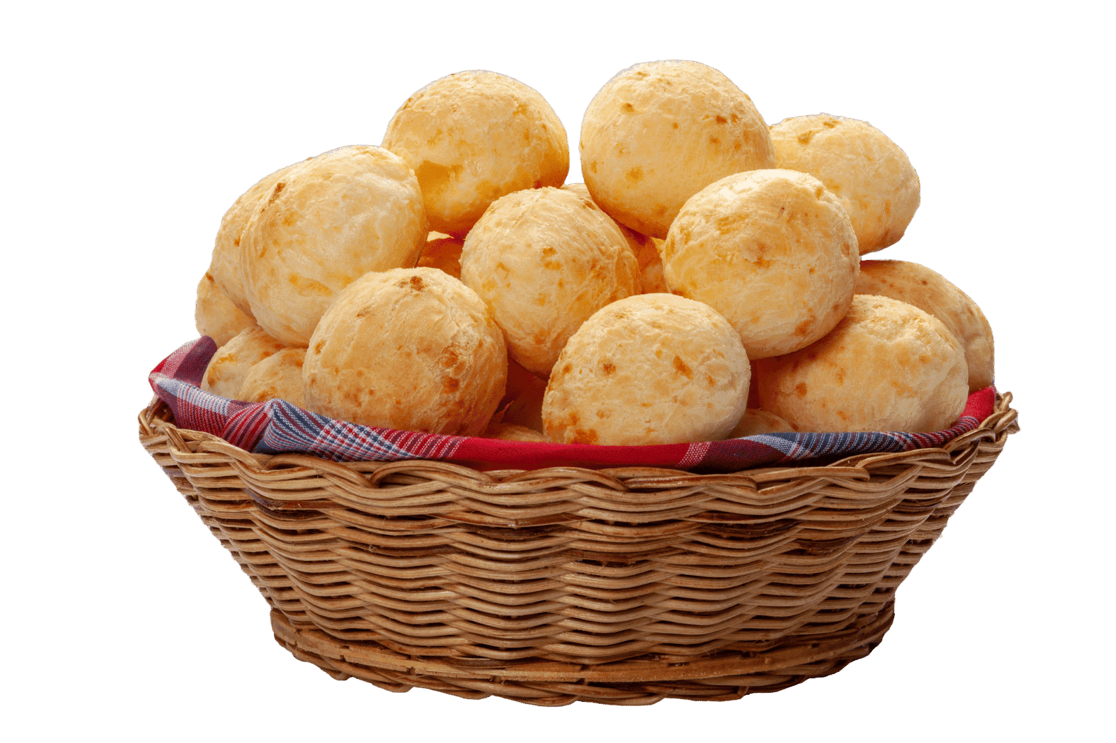 A basket of golden, freshly baked pão de queijo
